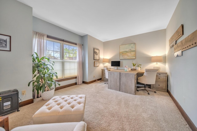 office with carpet flooring and baseboards