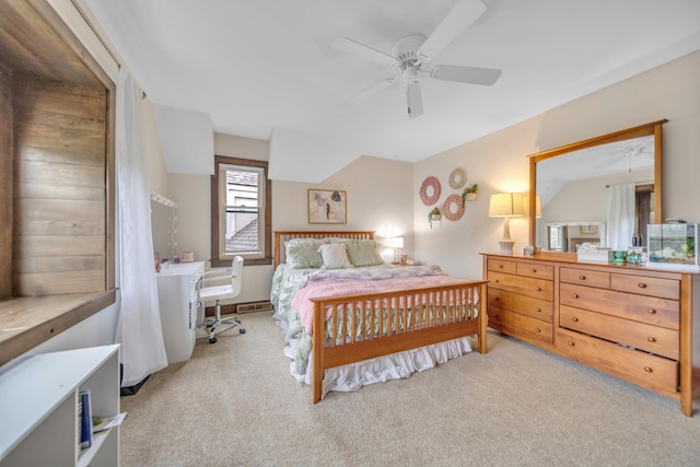 bedroom with carpet flooring, ceiling fan, and lofted ceiling