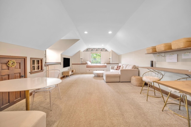 living room featuring recessed lighting, light carpet, and lofted ceiling