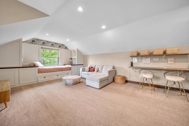 carpeted living area with lofted ceiling and recessed lighting