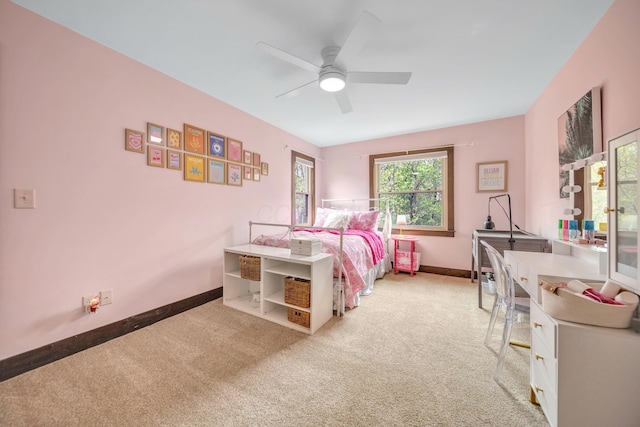 bedroom with baseboards, a ceiling fan, and carpet flooring