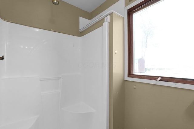 bathroom featuring a shower
