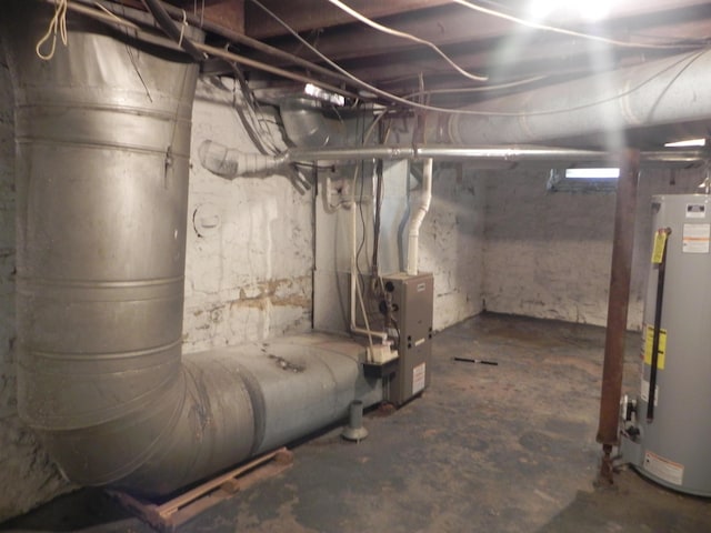 unfinished basement with gas water heater