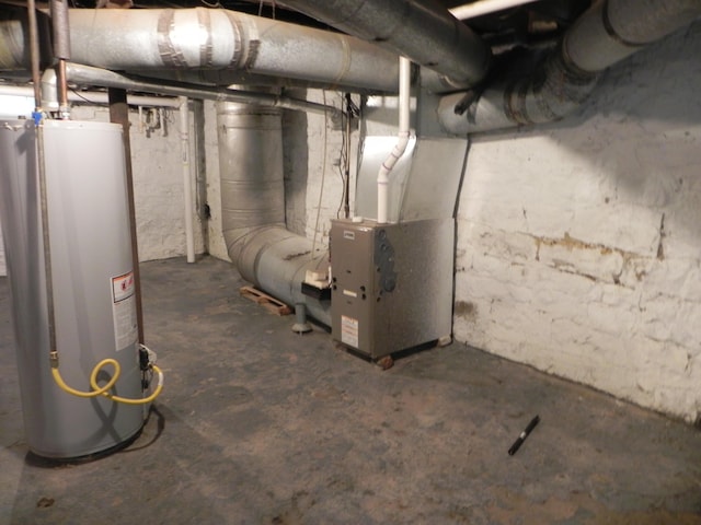 unfinished basement featuring gas water heater