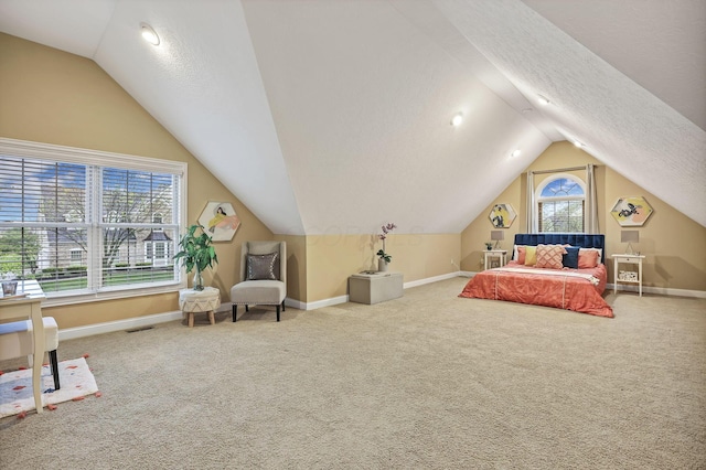 bedroom featuring baseboards, vaulted ceiling, carpet flooring, and visible vents