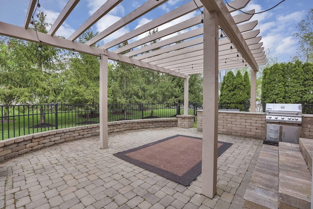 view of patio / terrace featuring area for grilling, a pergola, and a fenced backyard