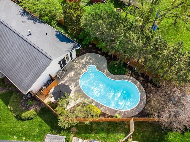 view of swimming pool featuring a patio area