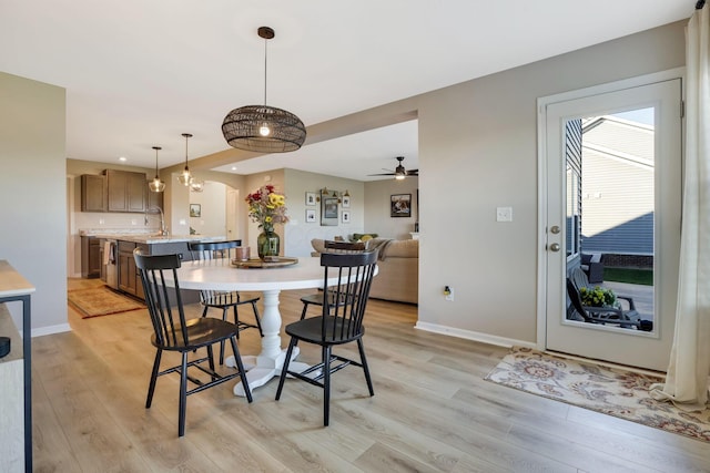 dining space with light wood-style floors, recessed lighting, baseboards, and ceiling fan