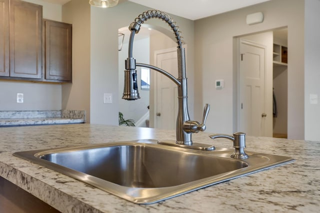interior details featuring a sink