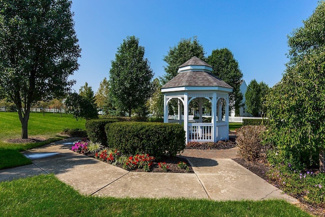view of community with a yard and a gazebo
