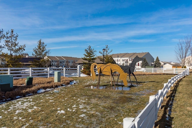 view of yard with fence and a residential view