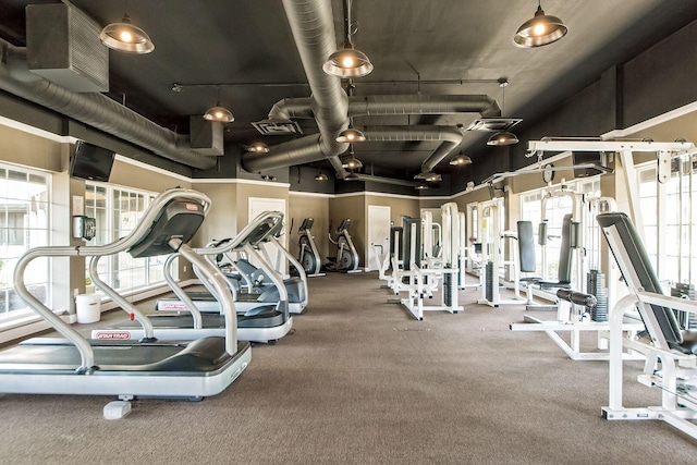 gym featuring visible vents