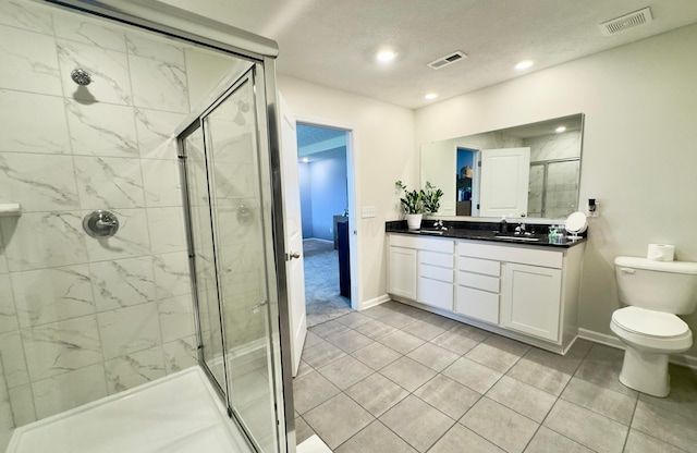 full bathroom with baseboards, visible vents, and a stall shower