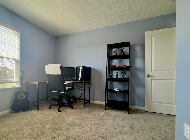 home office with carpet flooring, a textured ceiling, and baseboards