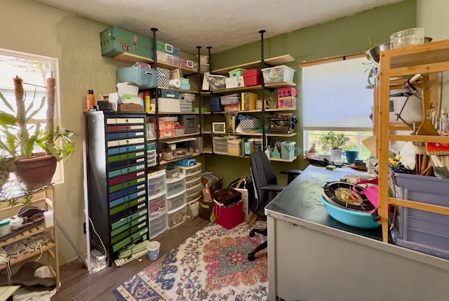 home office with wood finished floors
