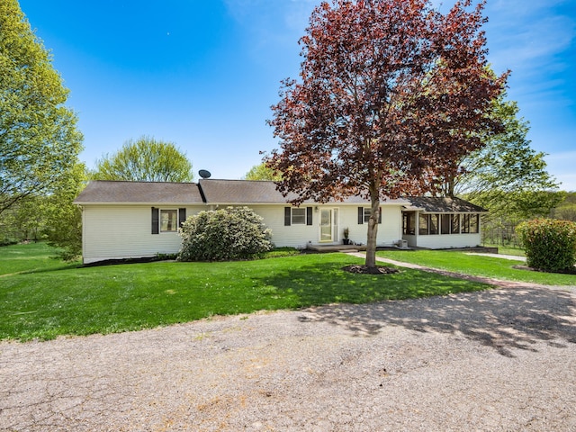 1305 Cooperriders Rd NW, Somerset, OH 43783 - view of front of property featuring a front yard and a sunroom