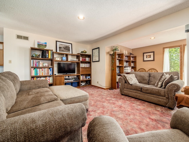 1305 Cooperriders Rd NW, Somerset, OH 43783 - living area featuring light colored carpet, recessed lighting, a textured ceiling, and visible vents