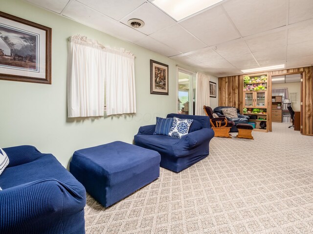 1305 Cooperriders Rd NW, Somerset, OH 43783 - carpeted living room featuring visible vents and a paneled ceiling