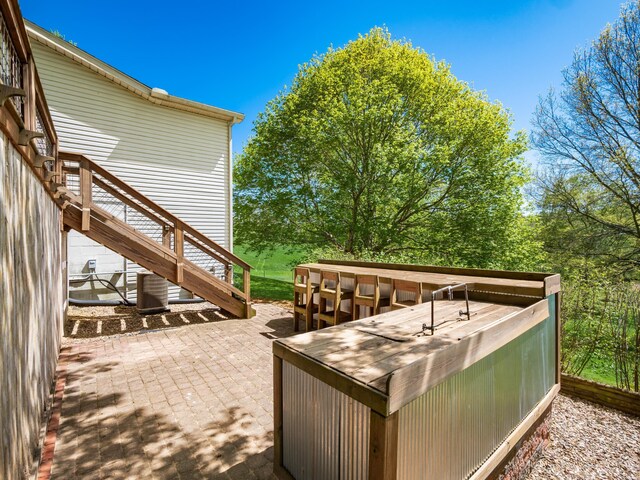 1305 Cooperriders Rd NW, Somerset, OH 43783 - wooden deck with stairs and a patio