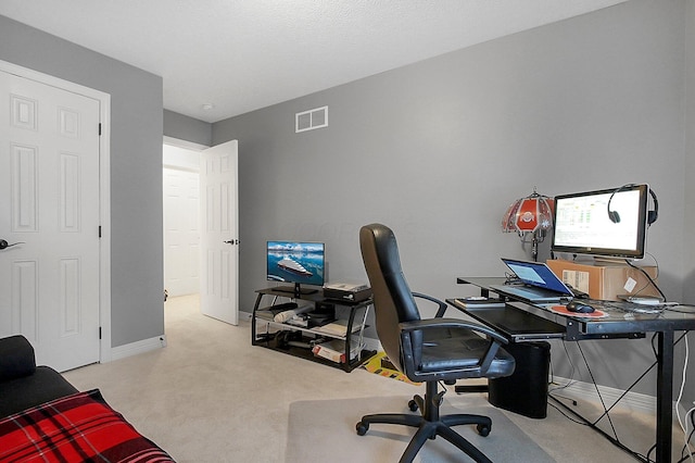 home office with baseboards, carpet, and visible vents