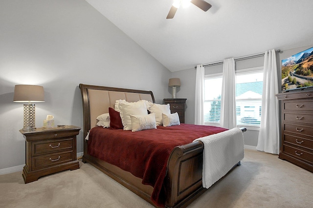 bedroom with baseboards, ceiling fan, lofted ceiling, and light colored carpet