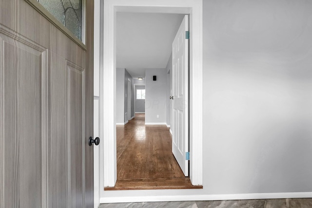 542 E Franklin St, Circleville, OH 43113 - corridor with baseboards and wood finished floors