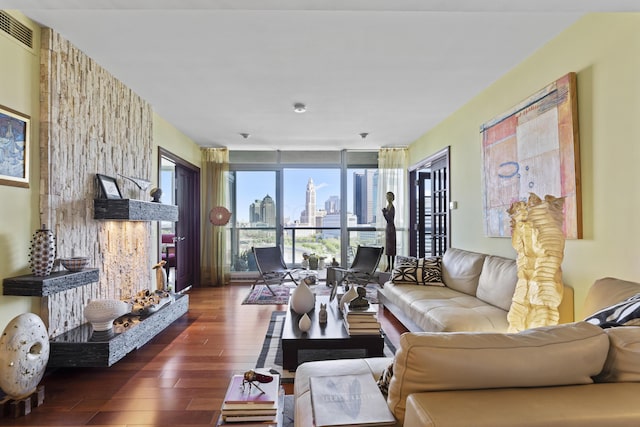 1 Miranova Pl Unit 1505, Columbus, OH 43215 - living room with hardwood / wood-style floors and a skyline view