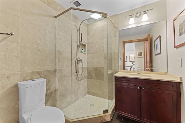 1 Miranova Pl Unit 1505, Columbus, OH 43215 - bathroom with a stall shower, vanity, and toilet