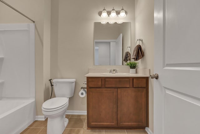 bathroom featuring tile patterned flooring, vanity, toilet, baseboards, and  shower combination
