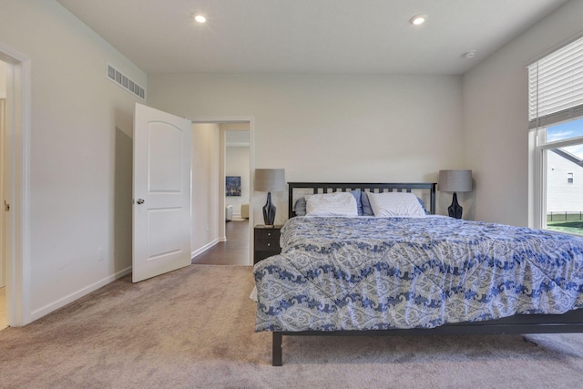 carpeted bedroom with baseboards, recessed lighting, and visible vents