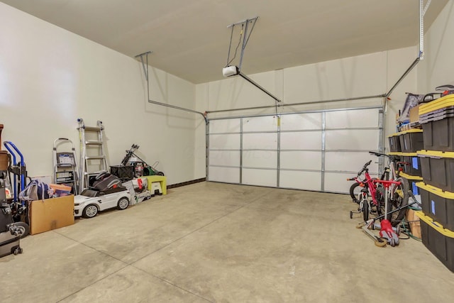 garage featuring a garage door opener