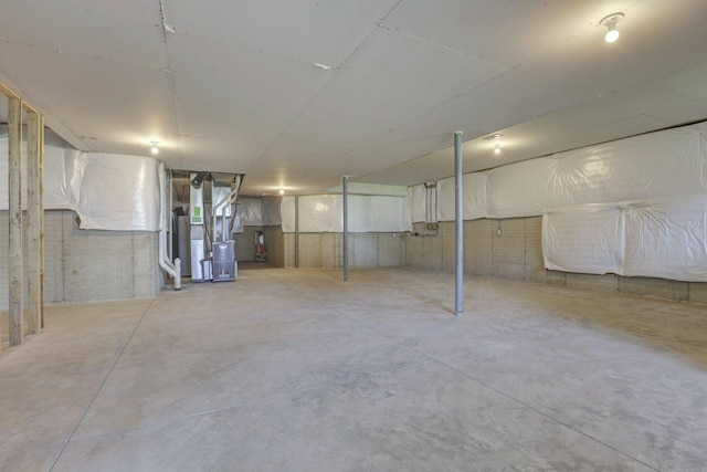 unfinished basement with heating unit