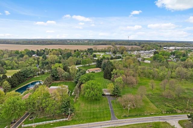 drone / aerial view with a water view and a rural view