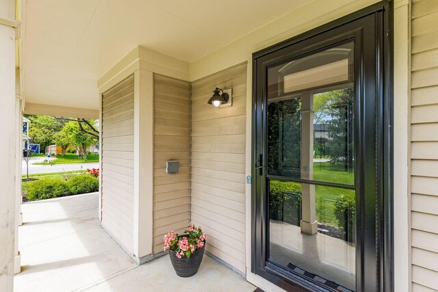 entrance to property with covered porch