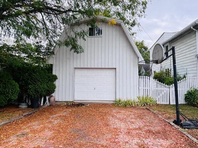 detached garage with fence