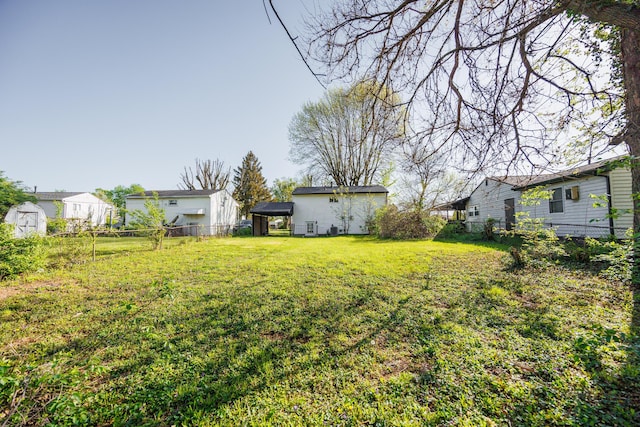 view of yard with a gazebo and fence