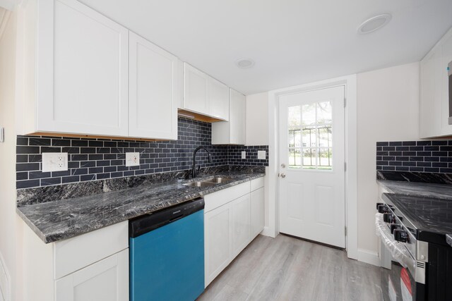 kitchen with dishwashing machine, light wood-type flooring, stainless steel electric range, white cabinetry, and a sink