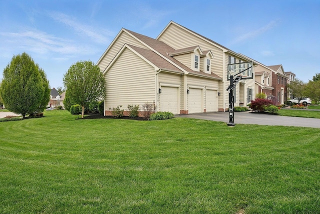 view of side of home featuring a yard, aphalt driveway, a shingled roof, and a garage