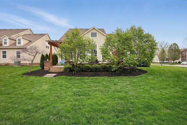 exterior space with a lawn, central AC, and a pergola