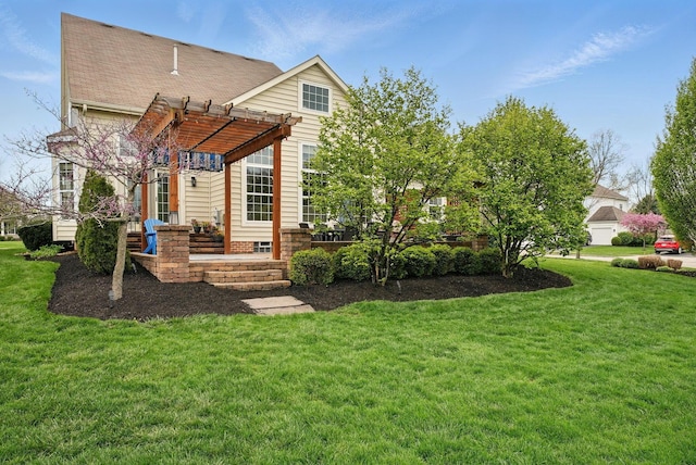 back of property featuring a lawn, roof with shingles, and a pergola