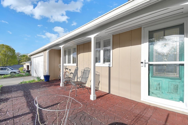 view of patio with an attached garage