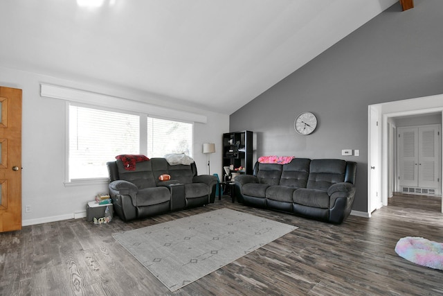 living area featuring baseboards, wood finished floors, and high vaulted ceiling