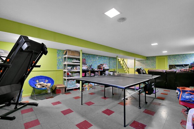rec room with tile patterned floors