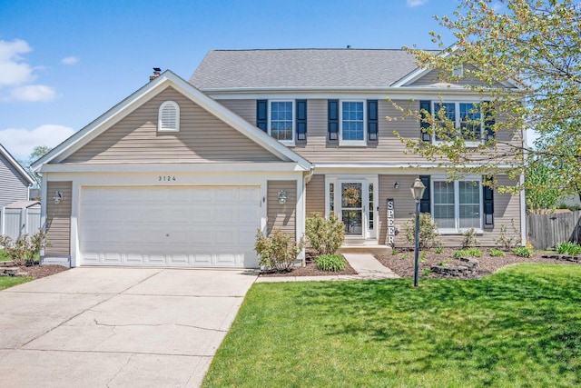 view of front of property with an attached garage, a chimney, a front yard, and concrete driveway