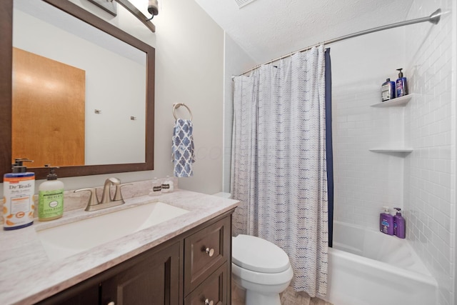 full bathroom featuring vanity, toilet, and shower / tub combo