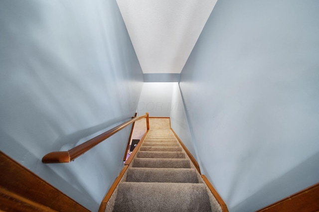 staircase with baseboards