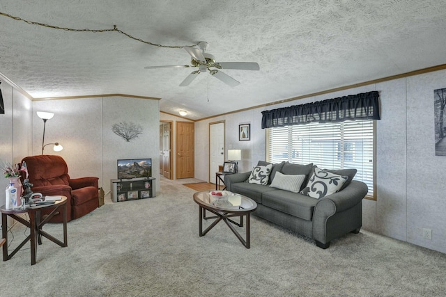 living room with a ceiling fan, a textured ceiling, ornamental molding, vaulted ceiling, and carpet floors