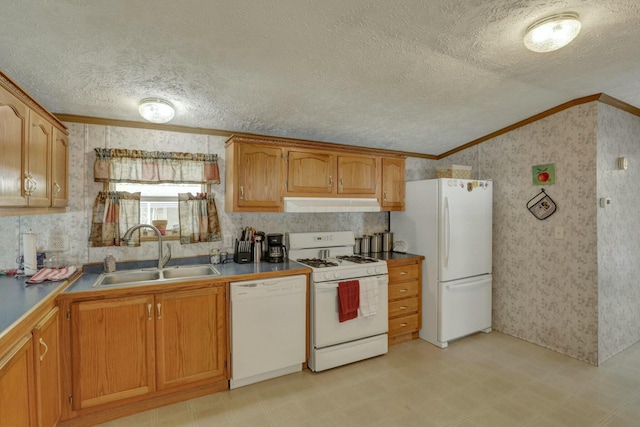 kitchen featuring wallpapered walls, white appliances, crown molding, and a sink