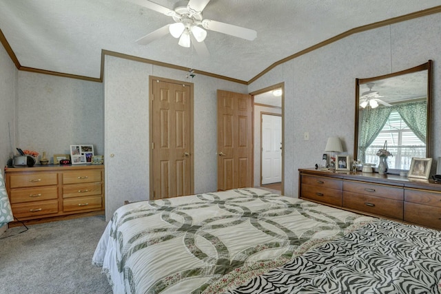 bedroom featuring wallpapered walls, a textured ceiling, ornamental molding, vaulted ceiling, and carpet floors