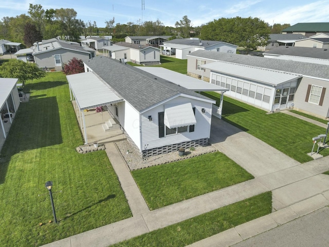 drone / aerial view featuring a residential view